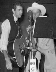 With Ernest Tubb during Opry broadcast.