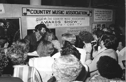 Sonny signing autographs at 1979 Fan Fair promoting the CMA awards show.