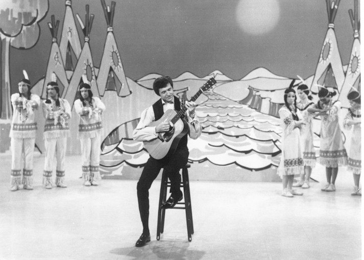 Singing one of his most popular hits – Running Bear on the Sullivan show.
