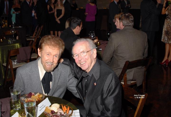 Charlie Louvin and Sonny enjoying some time to visit during a Hall Of Fame reception.