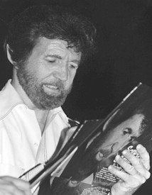 Sonny signing autographs following one of his many appearances.