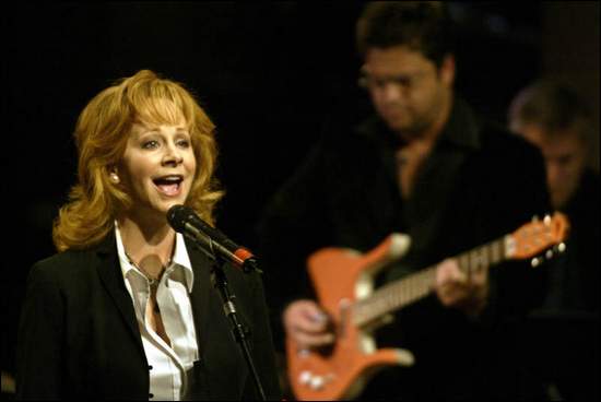 Reba McEntire performing during the evening's celebration.