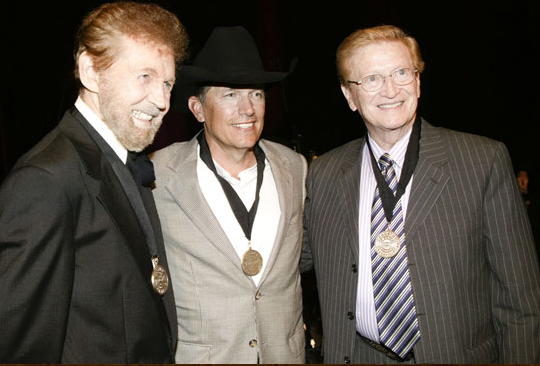 COUNTRY MUSIC HALL OF FAME INDUCTION: A photo for the ages... Three men whose talents, recordings